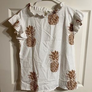Gold pineapple top size XL runs small